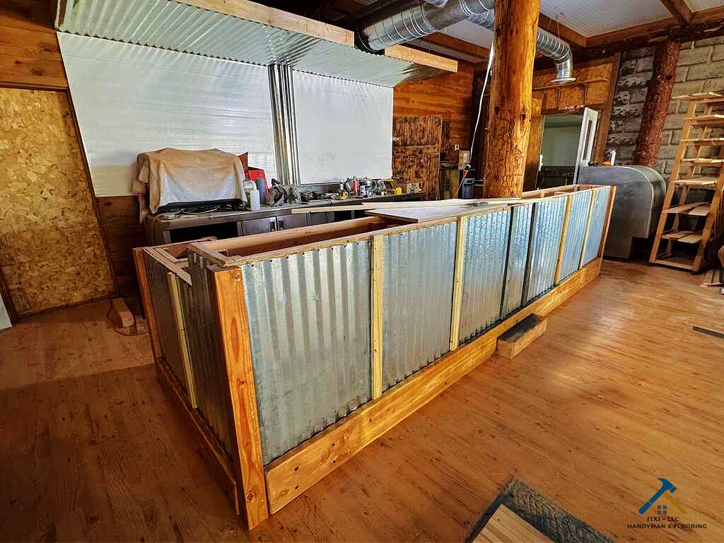 Custom Bars and Reclaimed Wood by FIXI LLC Remodeling Company in Utah County FIXI LLC's carpentry team installing custom wood shelves in a Utah County home. The wood shelving provides a clean and stylish storage solution, with smooth finishes and precision cuts. Ideal for homeowners seeking functional and aesthetically pleasing woodwork...